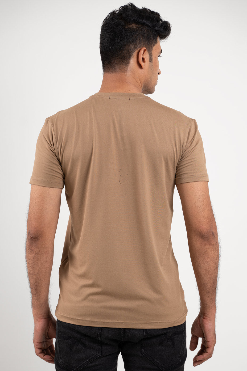 Back view of the beige Henley t-shirt, showcasing its simple and elegant design