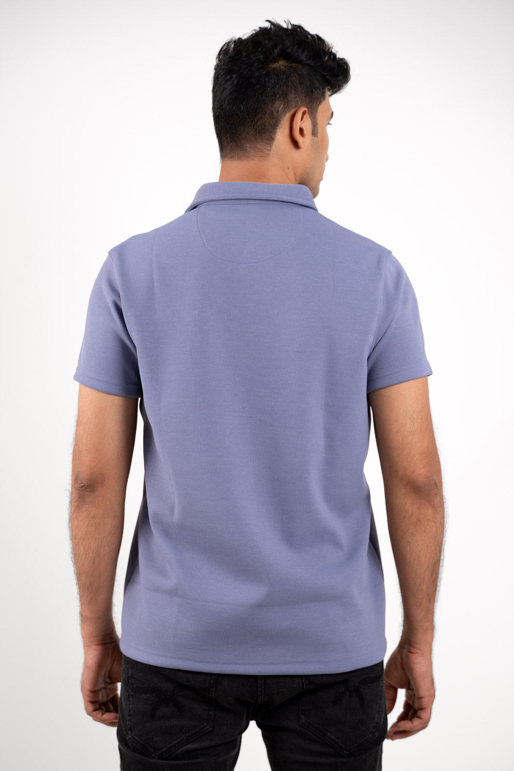 Back view of the solid lavender zipper polo shirt, emphasizing its clean lines and smooth finish