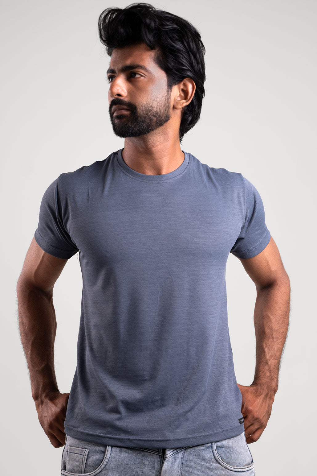 Front view of a staple grey crewneck t-shirt, embodying simplicity and versatility